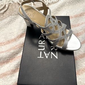 Worn once excellent condition. Silver glitter , size 8